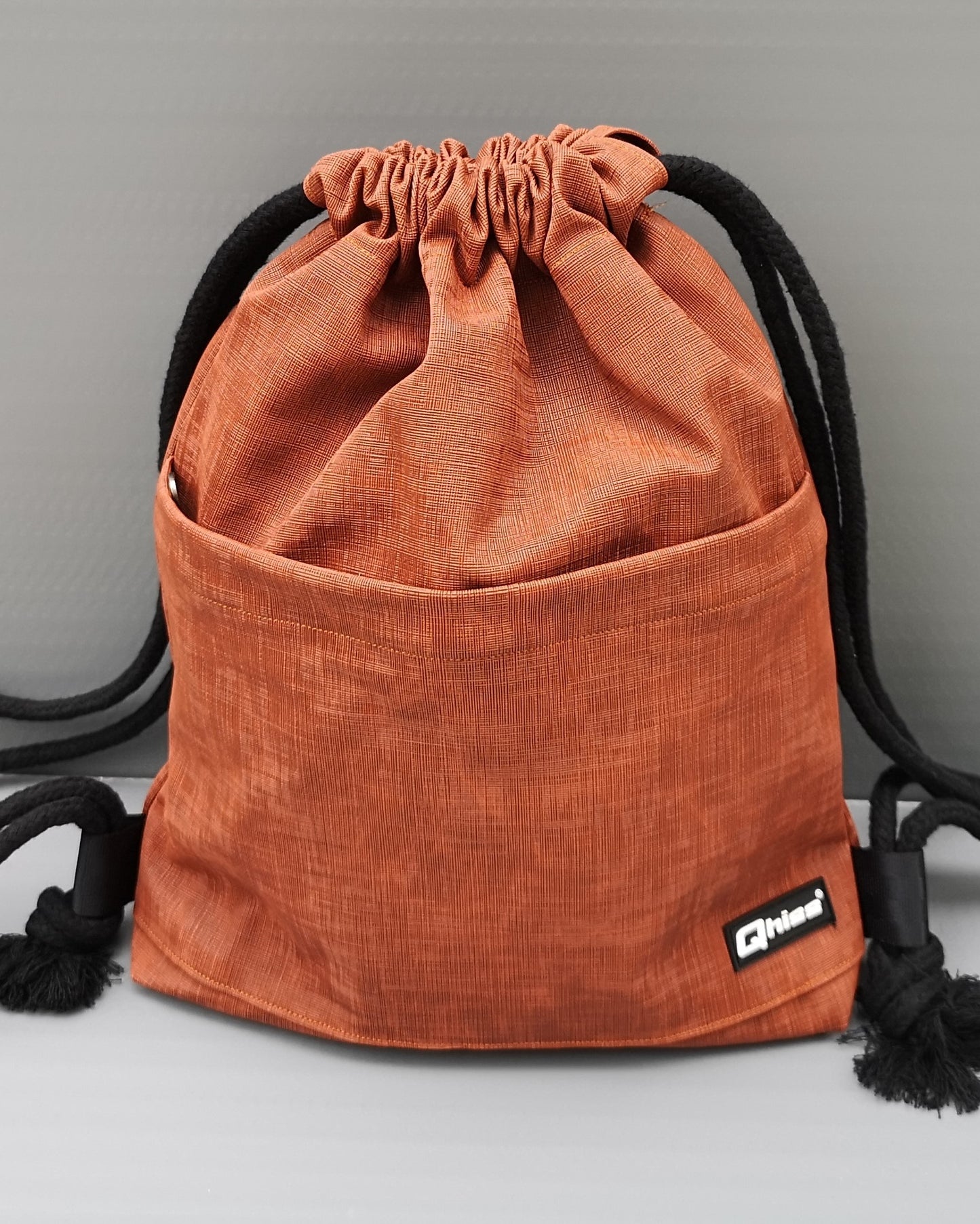 Drawstring Bag in Vegan Leather Orange